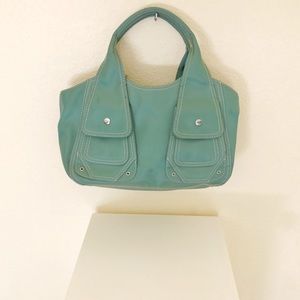 BCBG Light teal canvas handbag